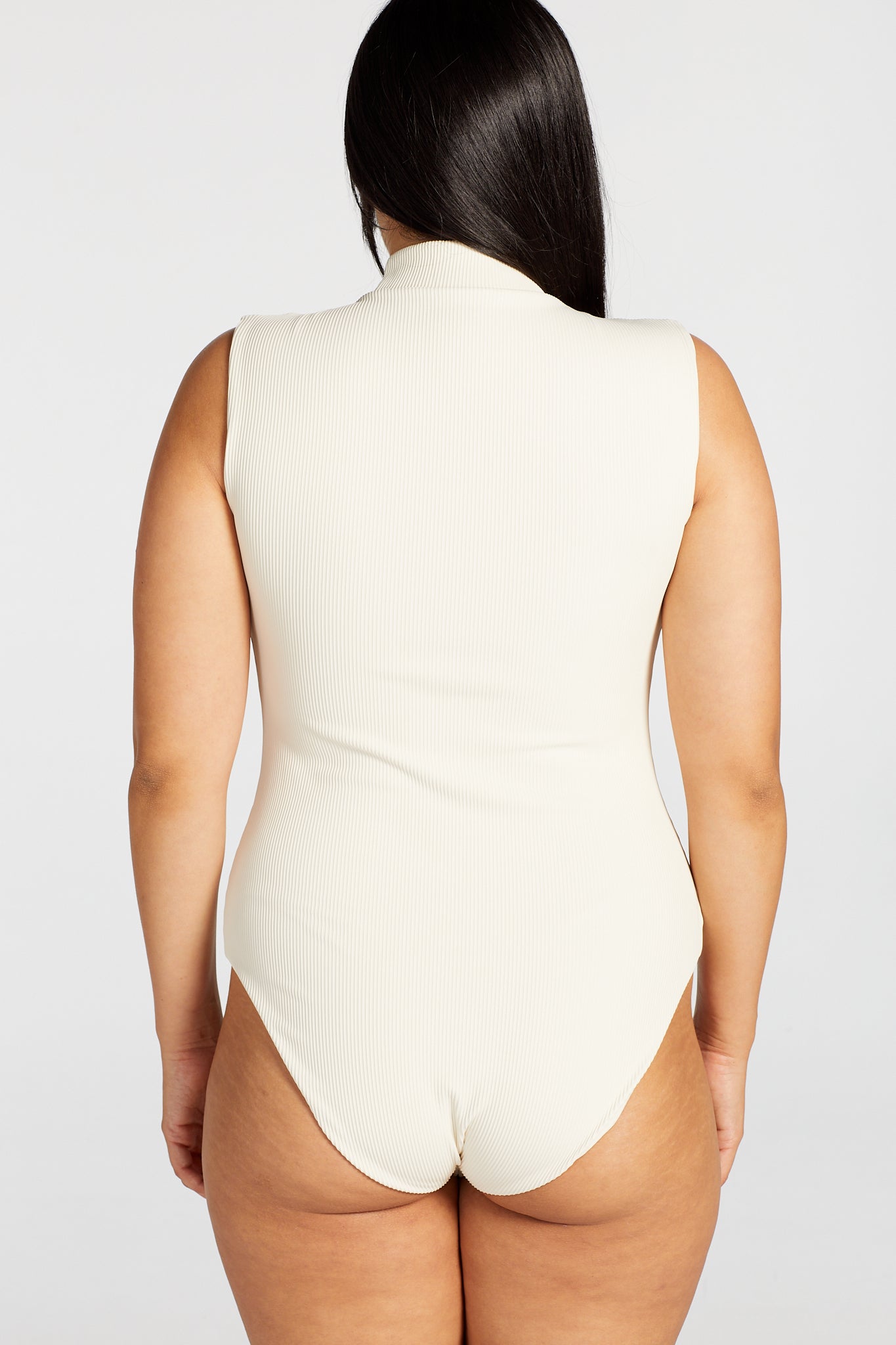 CORE RIBBED SLEEVELESS BODYSUIT CREAM